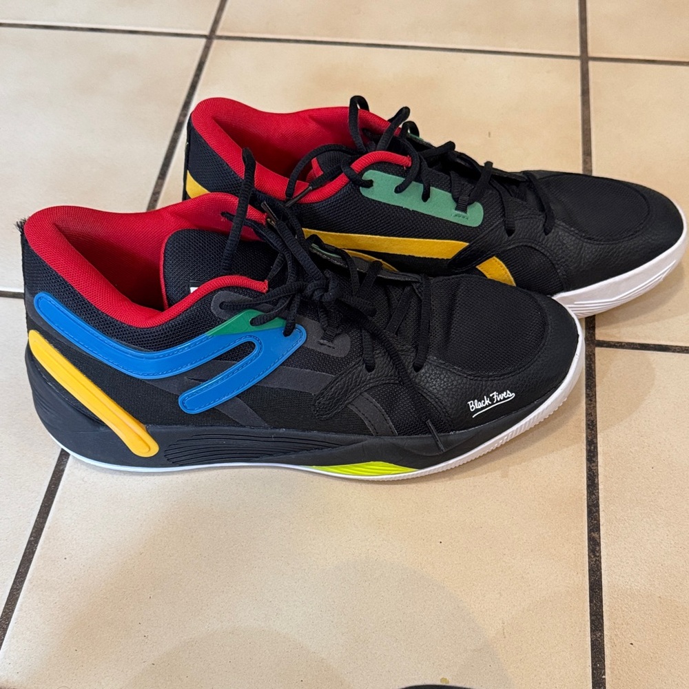 Puma TRC Blaze Court Black Fives basketball shoe in the Puma Black colorway.